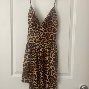 The outfit is fun, flowy, & makes me feel confident.Just grew out of this size.